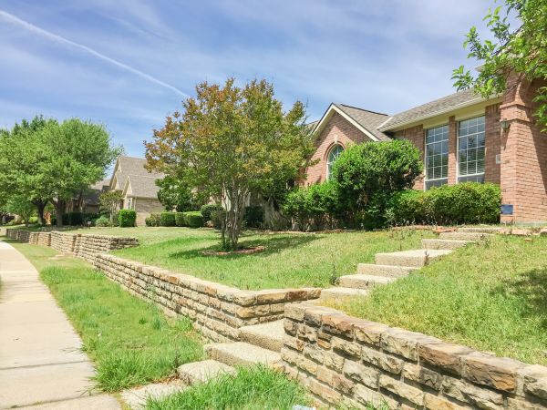 Sloped Yard Landscaping in Lehigh Acres